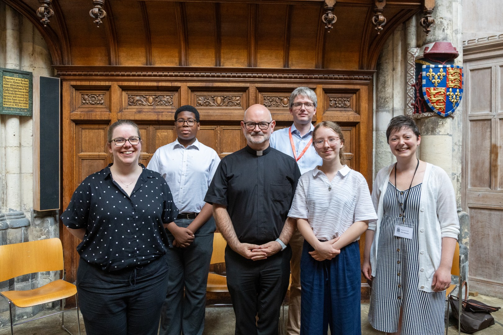 A group of people smiling in the Cathedral
